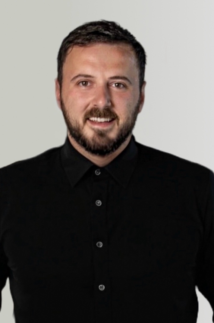 Tolga Headshot